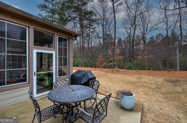 view of patio / terrace featuring grilling area and outdoor dining area