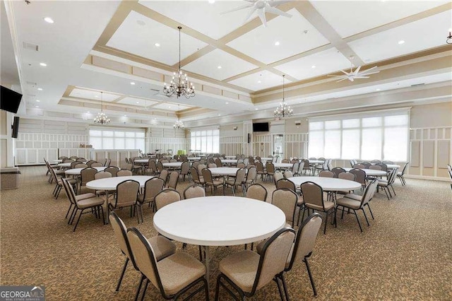 carpeted dining space featuring recessed lighting, visible vents, ornamental molding, coffered ceiling, and ceiling fan with notable chandelier