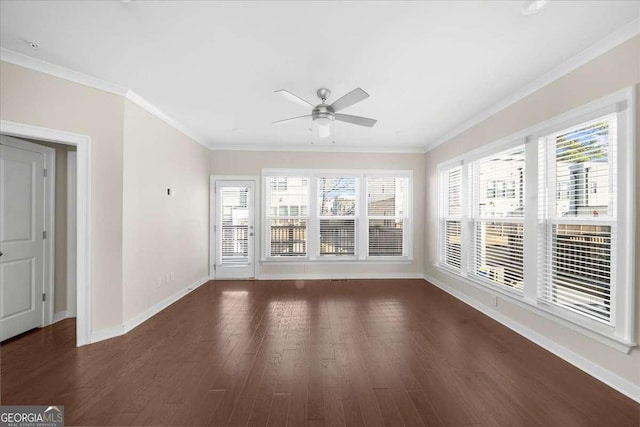 unfurnished sunroom with a ceiling fan