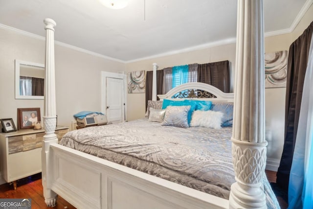 bedroom with ornamental molding, dark wood-type flooring, and ornate columns