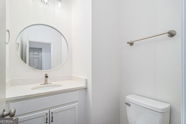1320 Kay Ter SE, Conyers, GA 30013 - bathroom with toilet and vanity