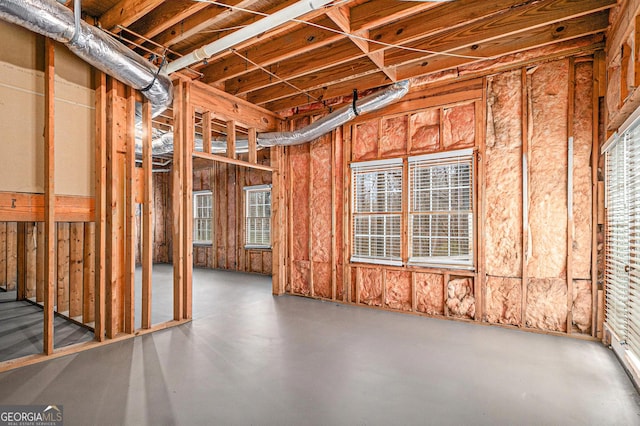 misc room with finished concrete floors and plenty of natural light