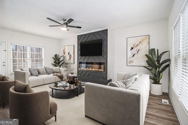 1320 Kay Ter SE, Conyers, GA 30013 - living room featuring a large fireplace, ornamental molding, and visible vents