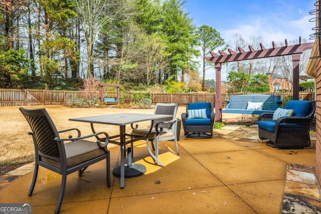 view of patio / terrace with a fenced backyard, outdoor dining area, and a pergola