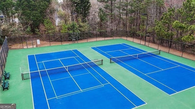 view of sport court with community basketball court and fence