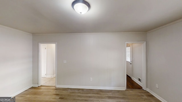 2134 Elinwood Dr, Atlanta, GA 30344 - empty room with crown molding and wood finished floors
