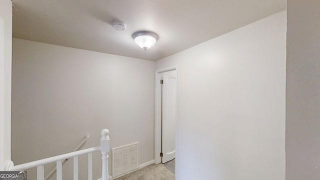 2134 Elinwood Dr, Atlanta, GA 30344 - corridor with light colored carpet and an upstairs landing