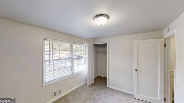 2134 Elinwood Dr, Atlanta, GA 30344 - unfurnished bedroom featuring a closet and carpet flooring