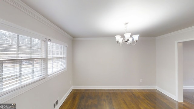 2134 Elinwood Dr, Atlanta, GA 30344 - empty room featuring a chandelier, wood finished floors, and ornamental molding