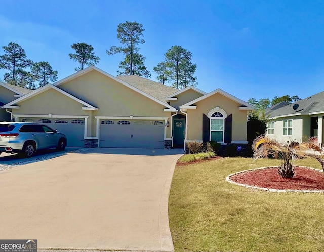 ranch-style house featuring an attached garage, driveway, and stucco siding