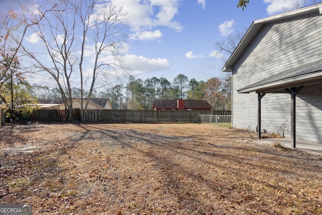 view of yard with fence