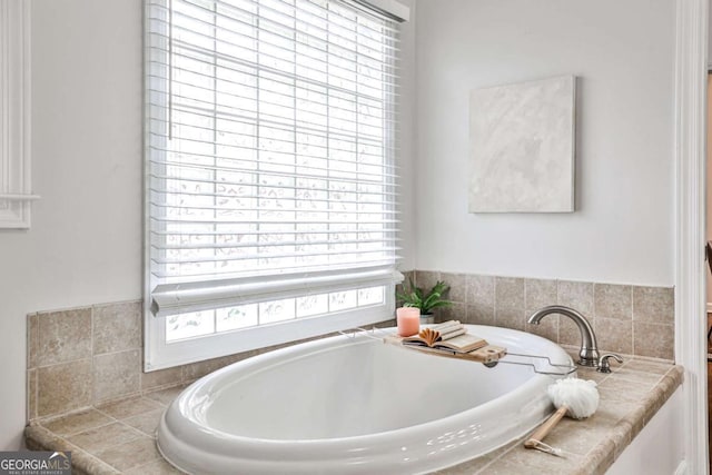 full bath with a garden tub