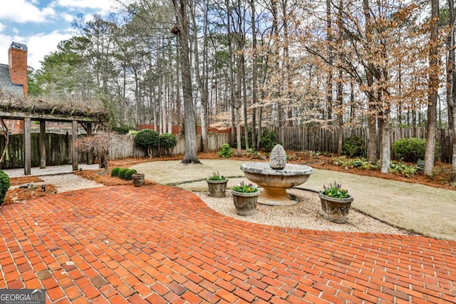 view of patio / terrace with fence