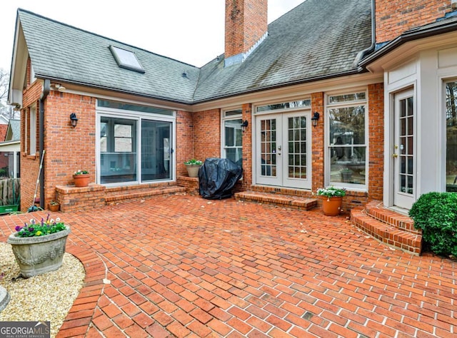 view of patio / terrace featuring entry steps and french doors