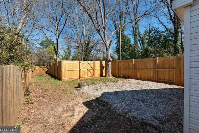 view of yard featuring a fenced backyard