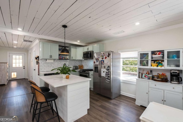 kitchen featuring open shelves, appliances with stainless steel finishes, dark wood finished floors, and tasteful backsplash