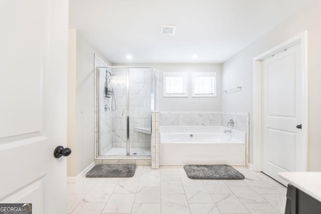 full bathroom with visible vents, a garden tub, a shower stall, and vanity