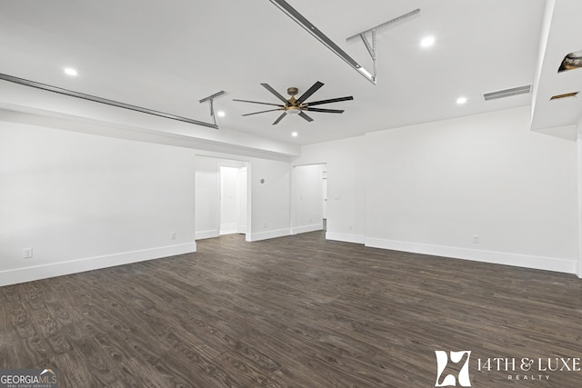 unfurnished living room with a ceiling fan, recessed lighting, dark wood finished floors, and baseboards