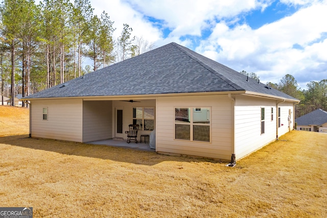 104 Eagle Heights Dr, Maysville, GA 30558 - rear view of house featuring a lawn, ceiling fan, a patio area, and roof with shingles