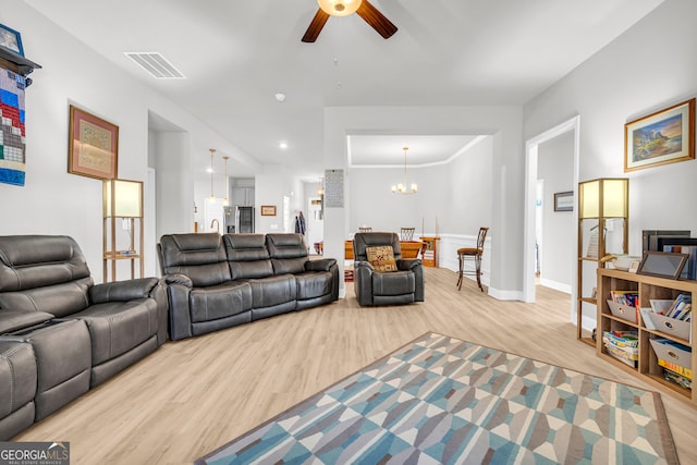 104 Eagle Heights Dr, Maysville, GA 30558 - living area with baseboards, visible vents, ceiling fan with notable chandelier, and light wood finished floors