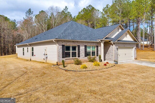 104 Eagle Heights Dr, Maysville, GA 30558 - craftsman-style home with driveway, a front yard, brick siding, and roof with shingles