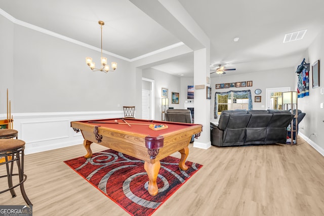 104 Eagle Heights Dr, Maysville, GA 30558 - recreation room featuring a wainscoted wall, ceiling fan with notable chandelier, visible vents, light wood-style floors, and ornamental molding