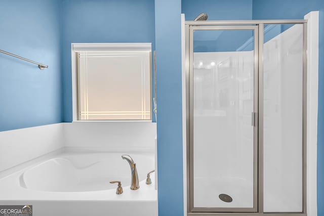 104 Eagle Heights Dr, Maysville, GA 30558 - bathroom featuring a bath and a shower stall