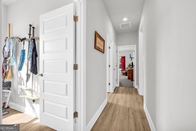 104 Eagle Heights Dr, Maysville, GA 30558 - hallway featuring light wood-style flooring, baseboards, and visible vents