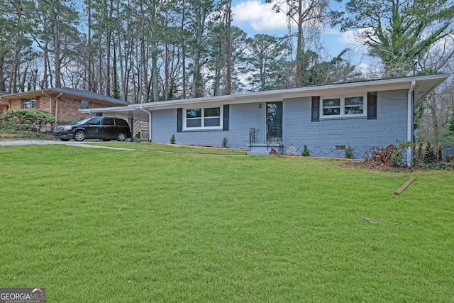 single story home with an attached carport, crawl space, brick siding, and a front yard