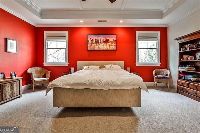 carpeted bedroom featuring ornamental molding, multiple windows, and visible vents