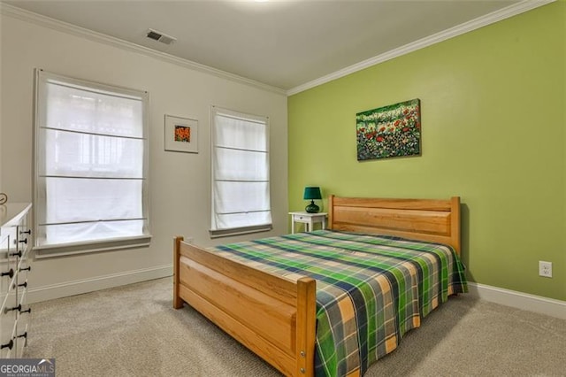 bedroom featuring carpet floors, visible vents, and ornamental molding