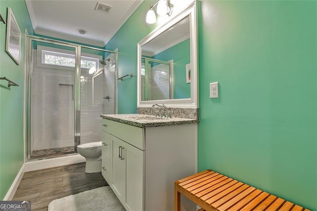 full bath featuring ornamental molding, a stall shower, and visible vents