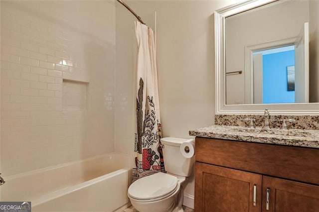 full bathroom featuring shower / tub combo, vanity, and toilet