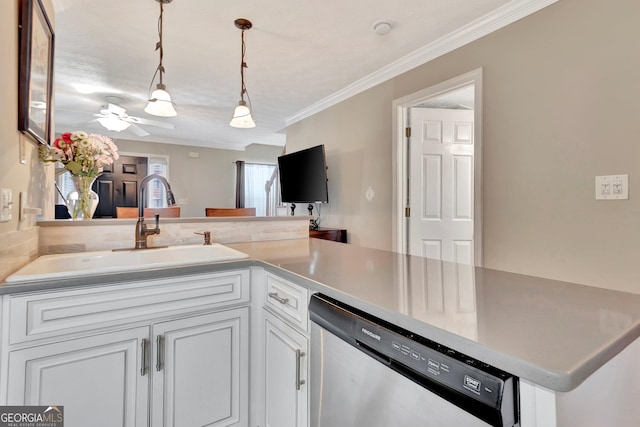 kitchen featuring a sink, white cabinets, ornamental molding, stainless steel dishwasher, and decorative light fixtures