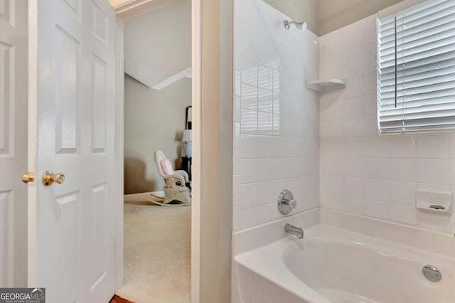 bathroom with washtub / shower combination