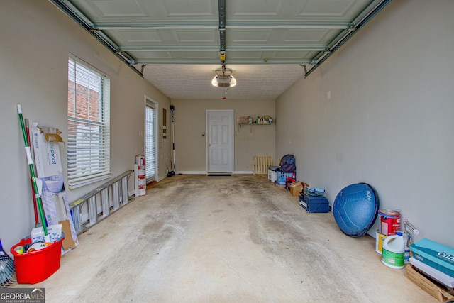 garage featuring a garage door opener