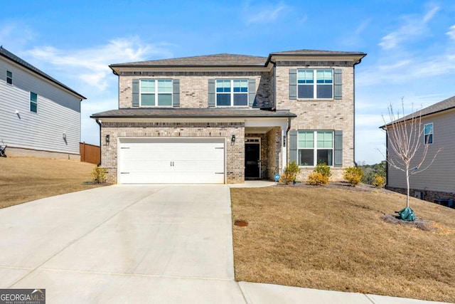 view of front of house with a garage, driveway, and brick siding