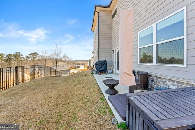 view of yard featuring fence, central AC, and a patio