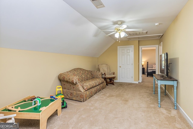 recreation room with lofted ceiling, carpet, visible vents, and baseboards