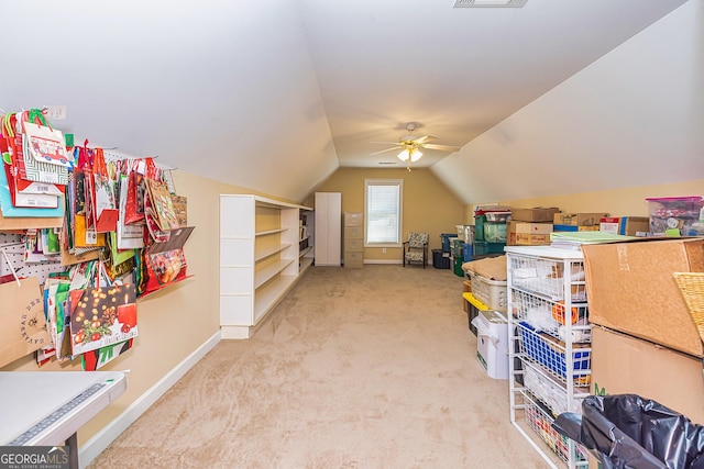 storage with ceiling fan and visible vents