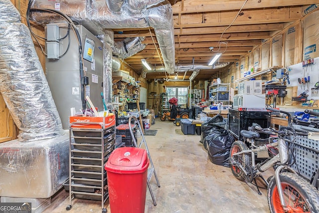 misc room with a workshop area and unfinished concrete floors