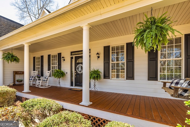 property entrance with covered porch