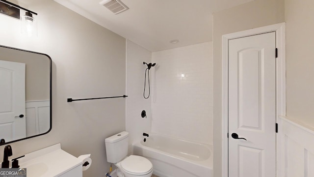 bathroom featuring shower / washtub combination, visible vents, vanity, and toilet