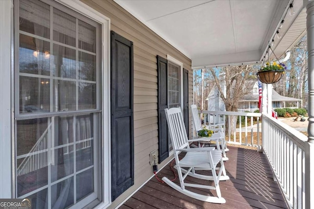 balcony featuring covered porch