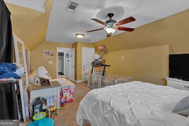 bedroom with baseboards, visible vents, a ceiling fan, vaulted ceiling, and carpet flooring