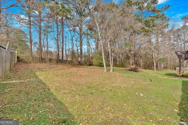 view of yard with fence