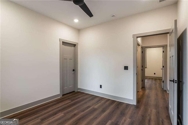 unfurnished bedroom with a ceiling fan, baseboards, dark wood-style flooring, and recessed lighting