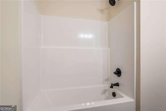 bathroom featuring shower / washtub combination