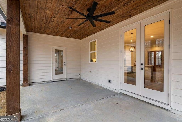 view of patio with ceiling fan and french doors