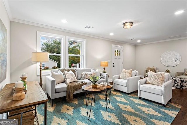 living room featuring recessed lighting, wood finished floors, visible vents, and crown molding